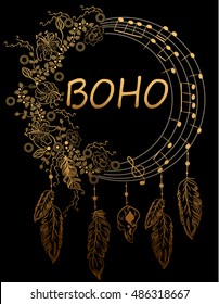 Flowers and notes in the gold dream catcher with feathers.