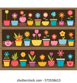 flowers in pots on wooden shelf