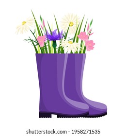 Flowers in rubber boots. Garden decor