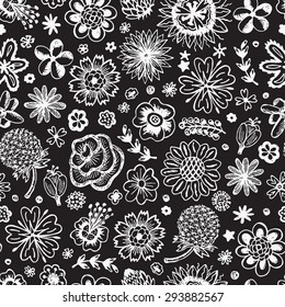 Flowers. Seamless pattern with flowers. Endless floral texture. Vintage floral wallpaper. Hand Drawn Doodles background. Black and white illustration