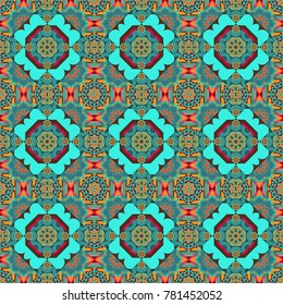 Flowers vector wallpaper. Colorful seamless pattern. Floral mandalas background in green, orange and blue colors.