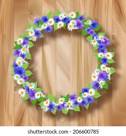 Flowers vector wreath greeting card with wildflowers on wooden planked background. Floral frame composition can be used as greeting card, invitation card for wedding, birthday and other holiday design
