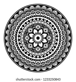 Flower-shaped mandala, black and white pattern. Can be used for greeting card, phone case print, etc. Hand drawn background, vector isolated on white. EPS10
