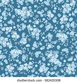 Flowery bright pattern in small-scale flowers. Calico millefleurs. Floral seamless blue background for textile or book covers, manufacturing, wallpapers, print, gift wrap and scrapbooking.