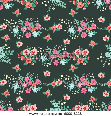 Flowery bright pattern in small-scale pink and blue flowers. Calico millefleurs. Floral seamless background for textile, surface, fabric, wallpapers, print, gift wrap and scrapbooking, decoupage.