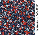 Flowery bright pattern in small-scale red and blue flowers. Liberty style millefleurs. Floral seamless background for textile, book covers, manufacturing, wallpapers, print, gift wrap and scrapbooking