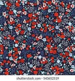 Flowery bright pattern in small-scale red and blue flowers. Liberty style millefleurs. Floral seamless background for textile, book covers, manufacturing, wallpapers, print, gift wrap and scrapbooking