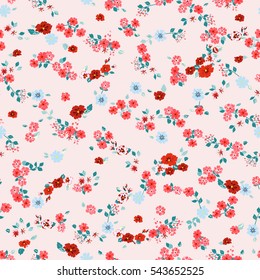 Flowery bright pattern in small-scale red and blue flowers. Liberty style millefleurs. Floral seamless background for textile, book covers, manufacturing, wallpapers, print, gift wrap and scrapbooking