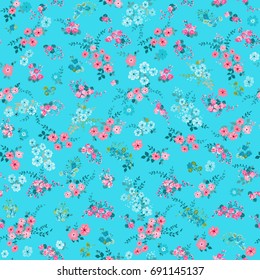 Flowery bright pattern in small-scale wild candy flowers. Liberty style millefleurs. Floral seamless background for textile, surface, fabric, wallpapers, print, gift wrap and scrapbooking, decoupage.