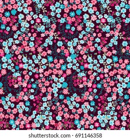 Flowery bright pattern in small-scale wild candy flowers. Liberty style millefleurs. Floral seamless background for textile, surface, fabric, wallpapers, print, gift wrap and scrapbooking, decoupage.