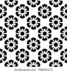 Flowery pattern. Black flowers on a white allover design. Oriental ornament. Graphic style seamless background. Decorative printing block. Vector illustration. Wallpaper, fabric, textile, scrap paper.