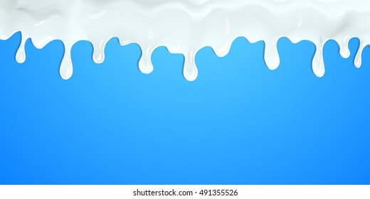 flowing milk on blue background