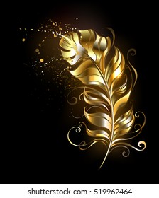 Fluffy feather of shiny gold on black background.