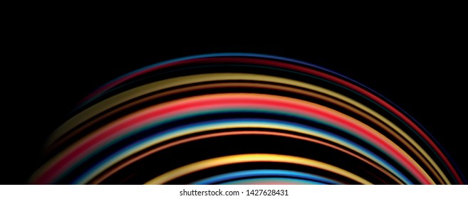 Fluid color swirls on black. Modern background with trendy design. Vector rainbow style