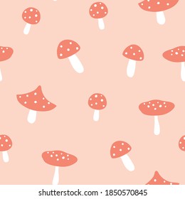 Fly agaric seamless pattern. Pink mushroom pattern design. Vector autumn forest illustration. Simple design for kids cloths.