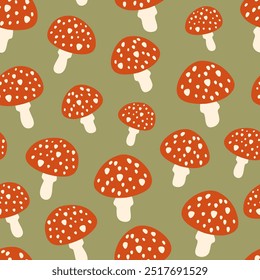 Fly agaric vector seamless pattern. Cute poisonous inedible red mushrooms with white dots on green background. Whimsical autumn forest toadstool repeat tile for seasonal Halloween and fall designs