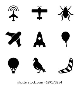 Fly icons set. set of 9 fly filled icons such as dove, beetle, plane, baloon, rocket, boomerang, air balloon