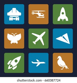 Fly icons set. set of 9 fly filled icons such as dove, rocket, cargo plane back view, plane, butterfly, helicopter