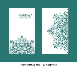 Flyer laser cut mandala. Cut paper card with lace pattern in dark teal. Wedding invitations, postcards and business card templates. Decorative cards for laser cutting.