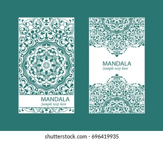 Flyer laser cut mandala. Cut paper card with lace pattern in dark teal. Wedding invitations, postcards and business card templates. Decorative cards for laser cutting.