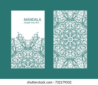 Flyer laser cut mandala. Cut paper card with lace pattern in dark teal. Wedding invitations, postcards and business card templates. Decorative cards for laser cutting.