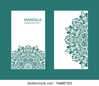 Flyer laser cut mandala. Cut paper card with lace pattern in dark teal. Wedding invitations, postcards and business card templates. Decorative cards for laser cutting.
