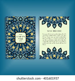 Flyer with round blue and orange mandala pattern and ornament. Oriental flyer mock-up, floral card design layout template. Size A5. Front and back sides. Editable and movable objects. EPS 10.