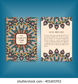 Flyer with round green, red and orange mandala pattern and ornament. Oriental flyer mock-up, floral card design layout template. Size A5. Front and back sides. Editable and movable objects. EPS 10.