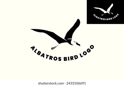 Flying Albatross bird logo design a logo design of an albatross bird in flight illustrated in negative space, a logo for conservation, travel agents, tourism, etc.