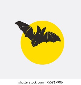 Flying Bat Silhouette in Moonlight Vector