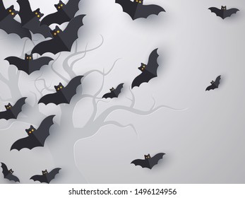 Flying bats background with copy space. 3d paper cut style. Grey background with tree silhouette for Halloween holiday. Vector illustration.