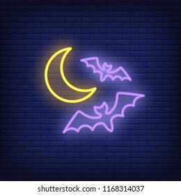 Flying bats neon sign. Luminous signboard with nocturnal animals. Night bright advertisement. Vector illustration in neon style for horror, Halloween, vampire