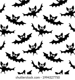Flying bats seamless pattern. Cute Spooky vector Illustration. Halloween backgrounds and textures in flat cartoon gothic style. Black silhouettes animals on sky