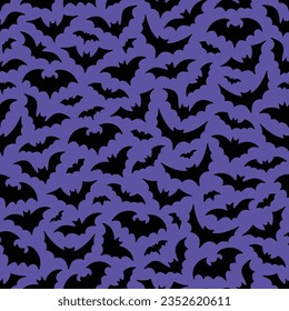 Flying bats silhouette seamless pattern on purple background