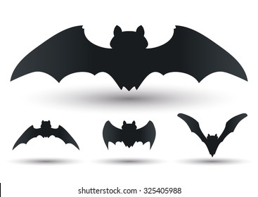 Flying bats silhouettes set in different forms and sizes.