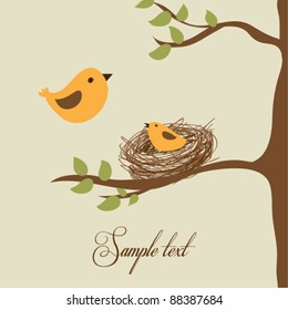 Flying bird and little bird in the nest