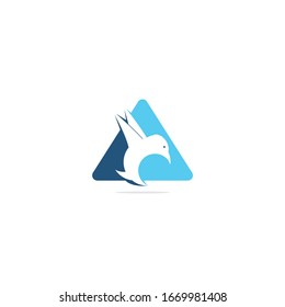 Flying bird logo in triangle shape. modern bird logo design concept .