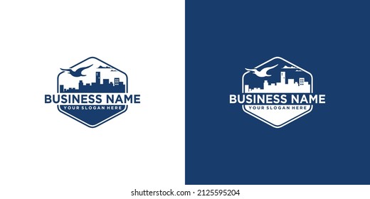 Flying bird over the city Branding Identity Corporate vector logo design template Isolated