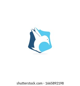 Flying bird in shield shape logo concept. modern bird logo design concept.