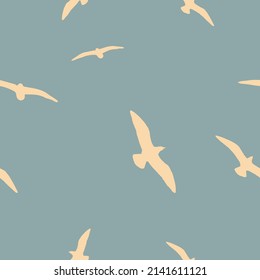 Flying birds in the blue sky. Seamless pattern. 