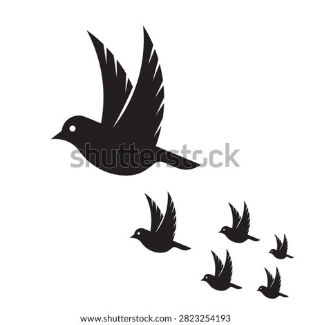 Flying birds silhouette vector design