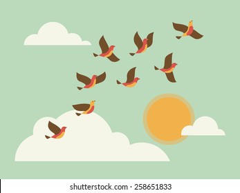 Flying birds in the sky with clouds and sun.