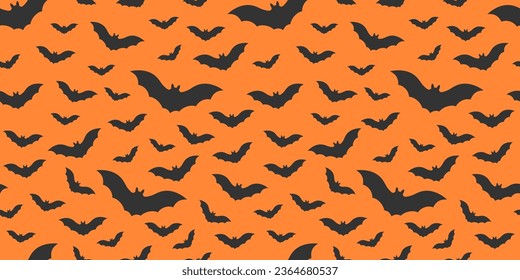 Flying black bat on an orange background. Halloween festive vector illustration. Seamless pattern for your design.