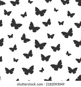 Flying black butterflies silhouette seamless pattern