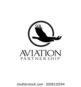 Flying black eagle round emblem vector logo design