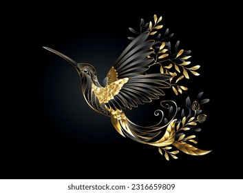 Flying, black, jewelry hummingbird with wings and tail, decorated with gold and black decorative twigs and leaves on black background. Golden hummingbird.