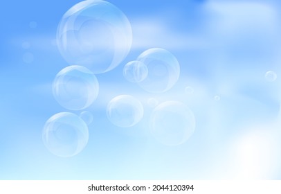 flying bubbles in the cloudy blue sky