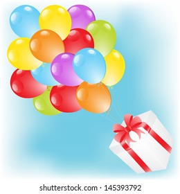 Flying colourful balloons with gift box