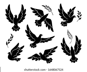 Flying dove black silhouettes.  Pigeons set peace and love symbols. Dove with olive branch Christian religious symbol. Isolated. Vector illustration