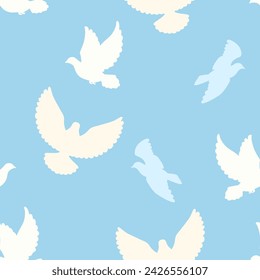 Flying doves seamless pattern. Vector background with white silhouettes of pigeons on blue.